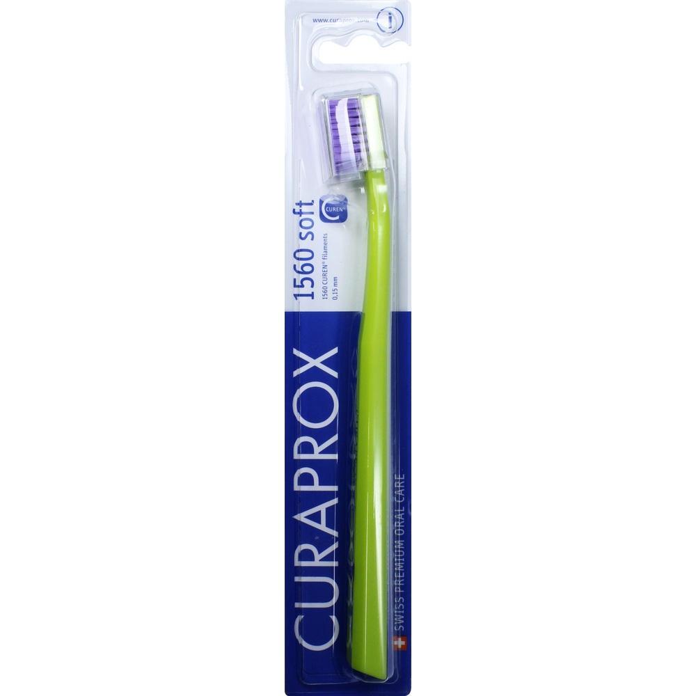 Eine gr&uuml;ne Zahnb&uuml;rste in einer blauen Verpackung.