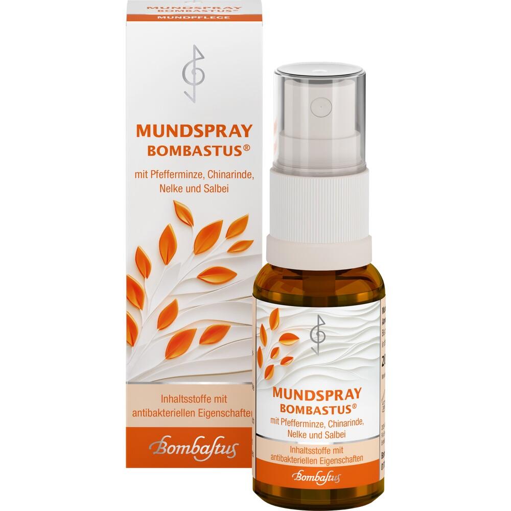 Braunes Fl&auml;schchen Mundspray mit orangener Verpackung und Bl&auml;ttern dekoriert.