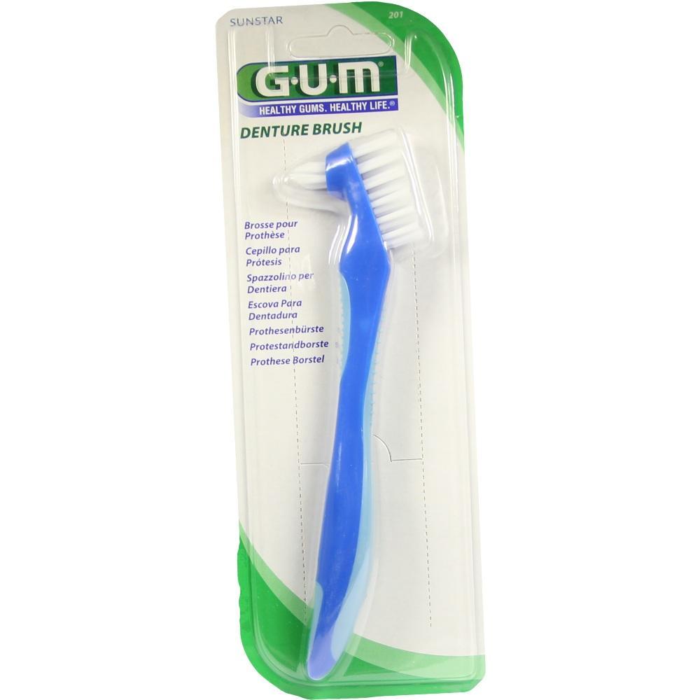 Eine blaue Zahnb&uuml;rste f&uuml;r Prothesen in einer Verpackung.