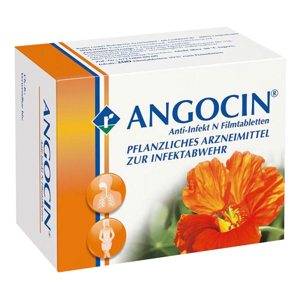 Eine Packung mit pflanzlichem Mittel gegen Infekte, daneben eine orange Blume.