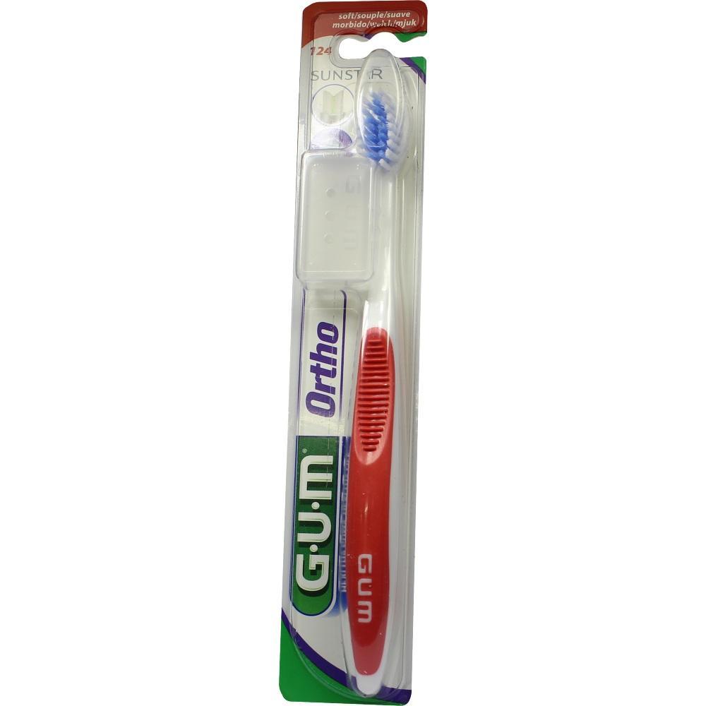 Eine Zahnb&uuml;rste mit rotem Griff in einer Plastikverpackung.