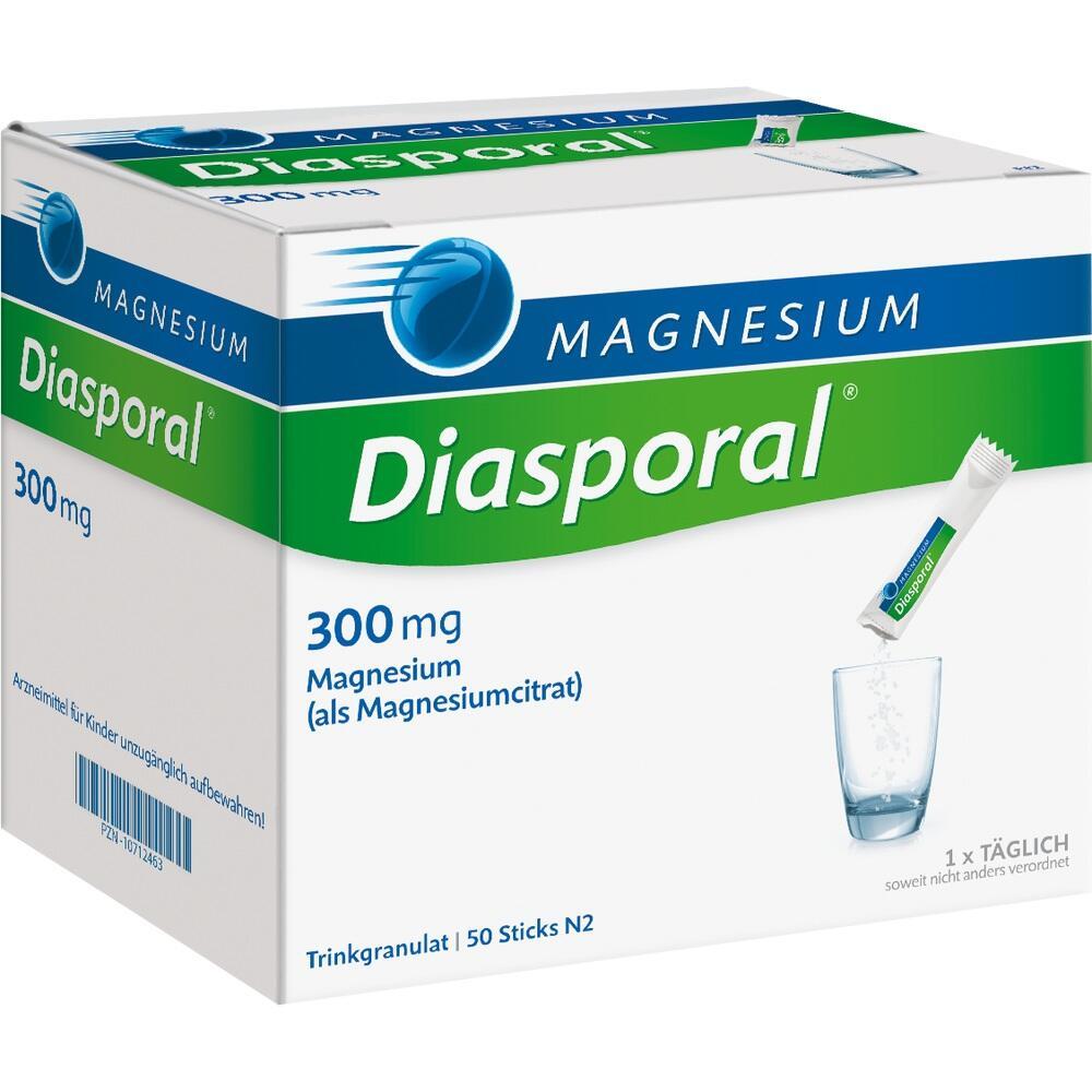 Eine Packung Diasporal Magnesium Sticks mit einem Glas.